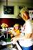 Monica helping Grandma in kitchen.jpg